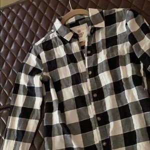 Black and white flannel with gold lining.